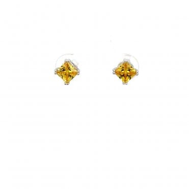 Silver four claw yellow cubic zirconia stud earrings